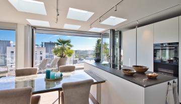 Resa Estates Ibiza te koop penthouse Marina botafoch for sale Ibiza kitchen table.jpeg